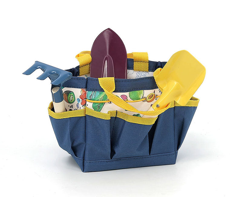 Cistell d'eines i regadora